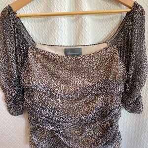 Anthropologie Leopard print evening top. Sheer sleeves. Rouging design. M. NWT.